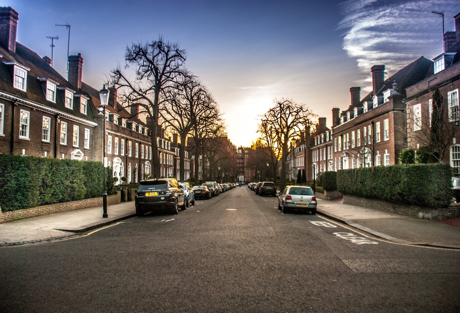 Chelsea street view with cars on either side.