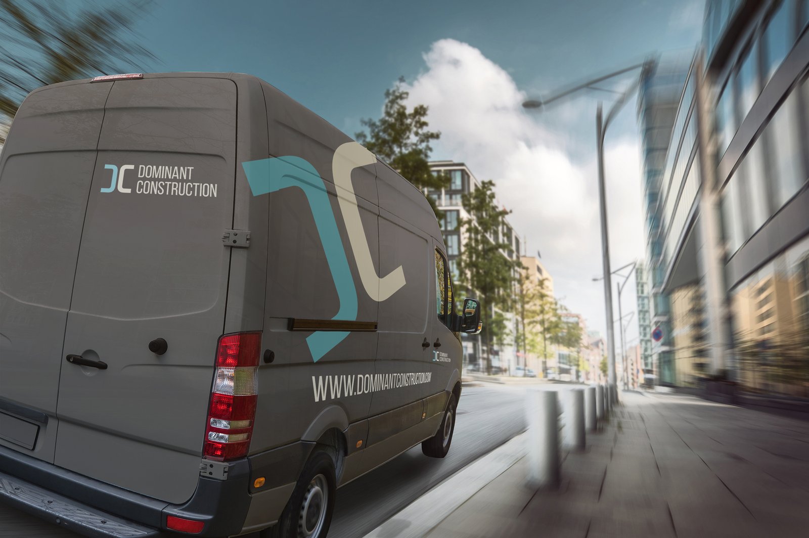 Contact Us Dominant Construction. Van with logo.