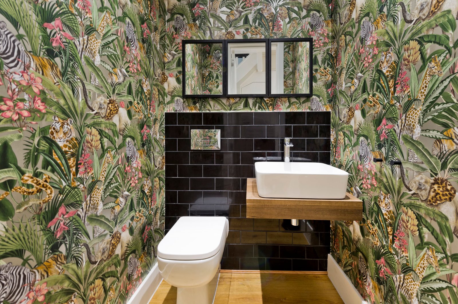 Silverton Road cloak room. Patterned wallpaper.