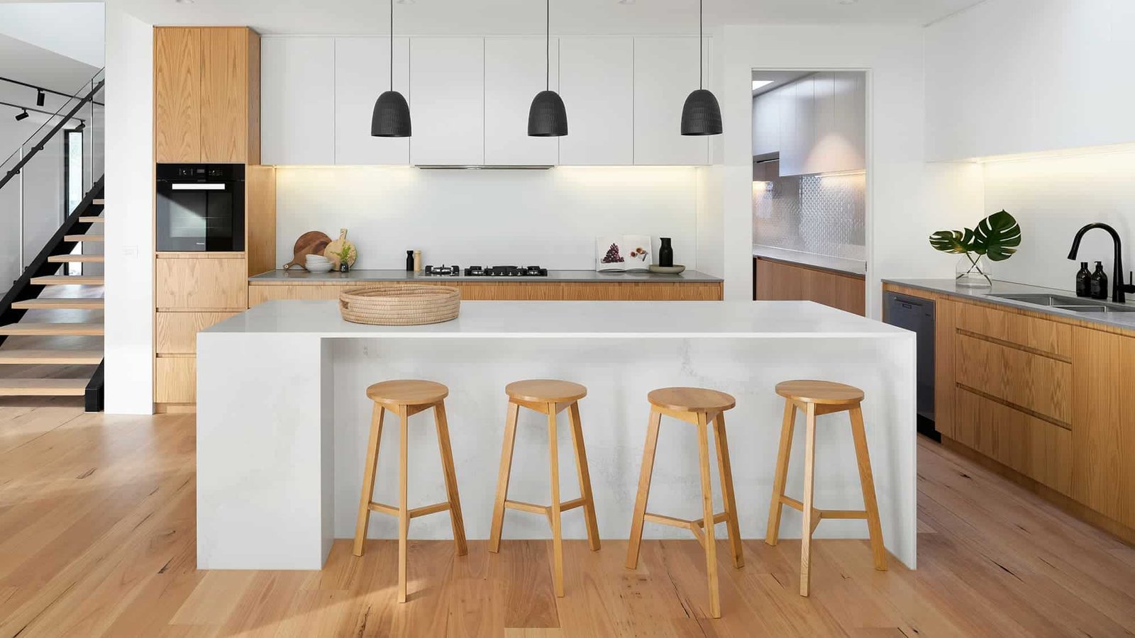 Kitchen Extension. Modern. White with wood. Kitchen Island with breakfast bar and stools.