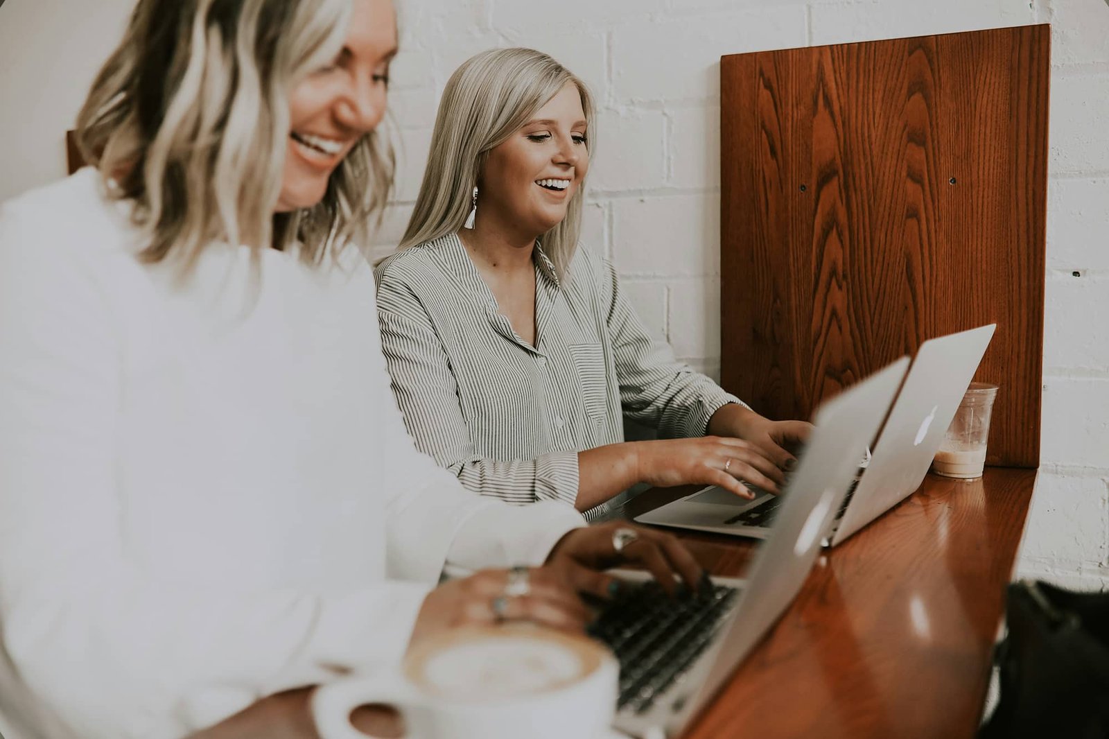 Essential Pre-Renovation Steps for London Homeowners. Two lawyers looking at computer screens side by side