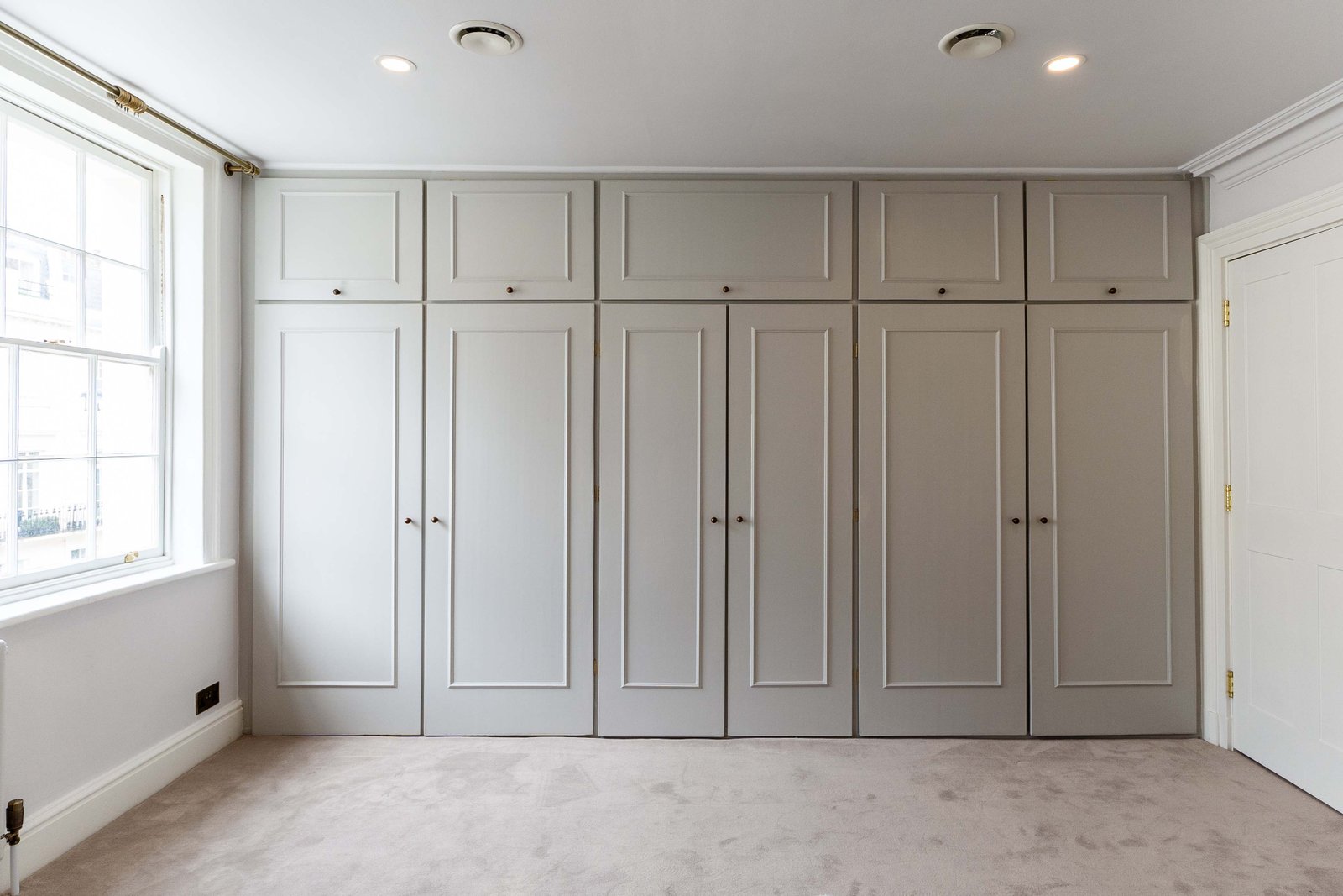 Master bedroom wardrobes in Belgravia full home renovation