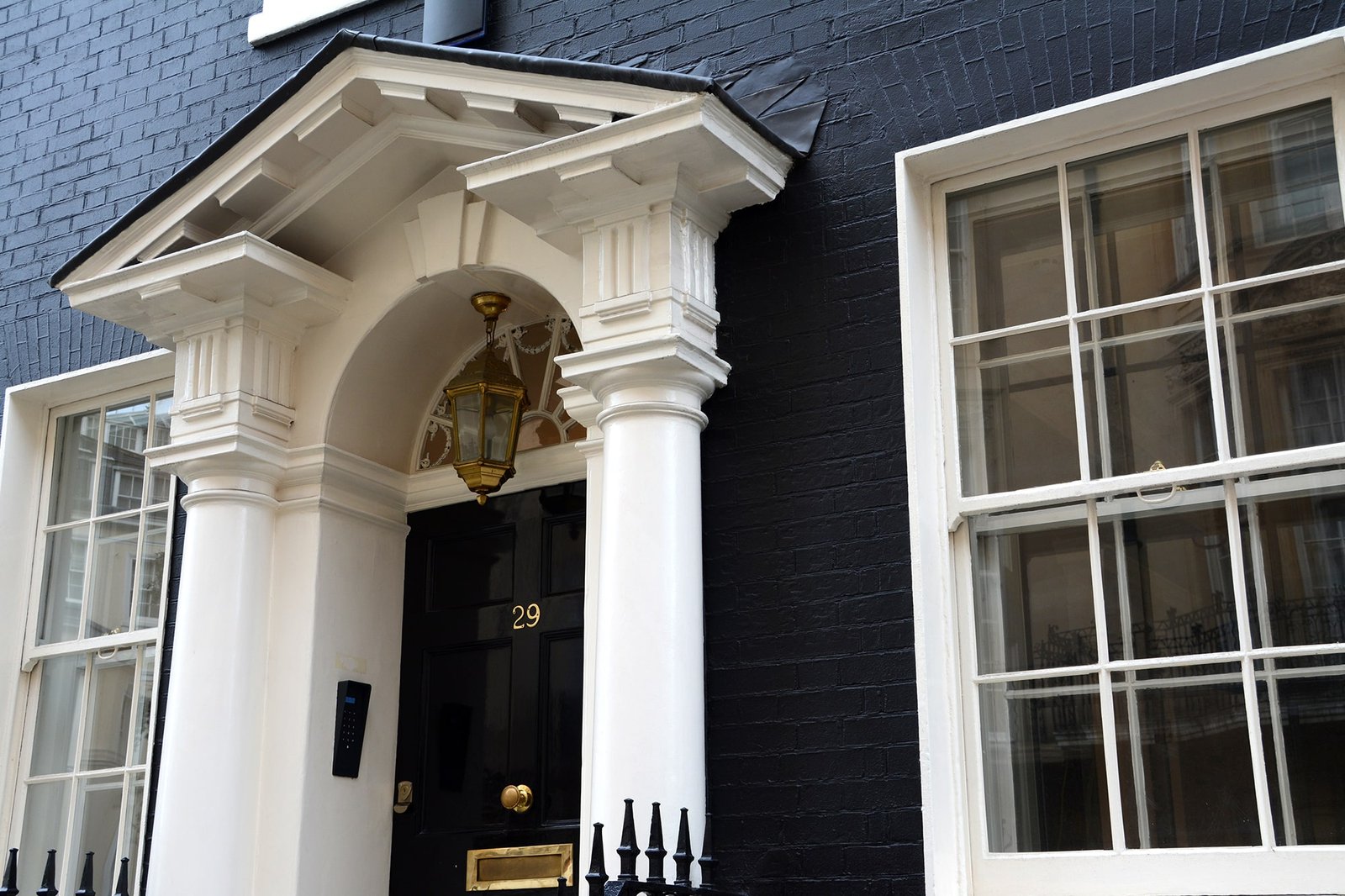 Essential Pre-Renovation Steps for London Homeowners. Two lawyers looking at computer screens side by side